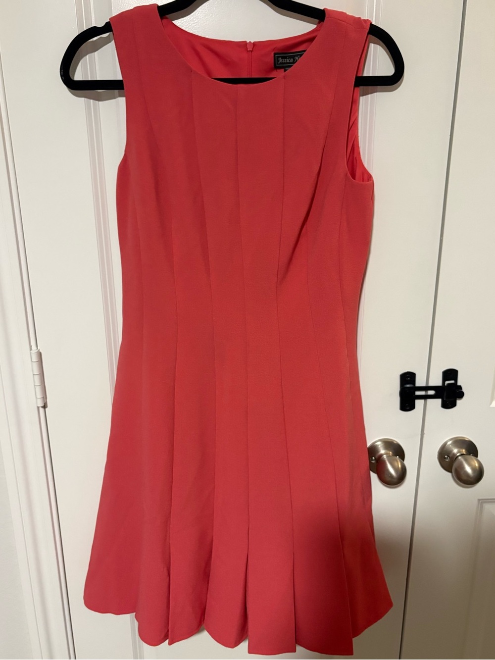 Jessica Howard Coral Sleeveless Pleated Hem Dress
